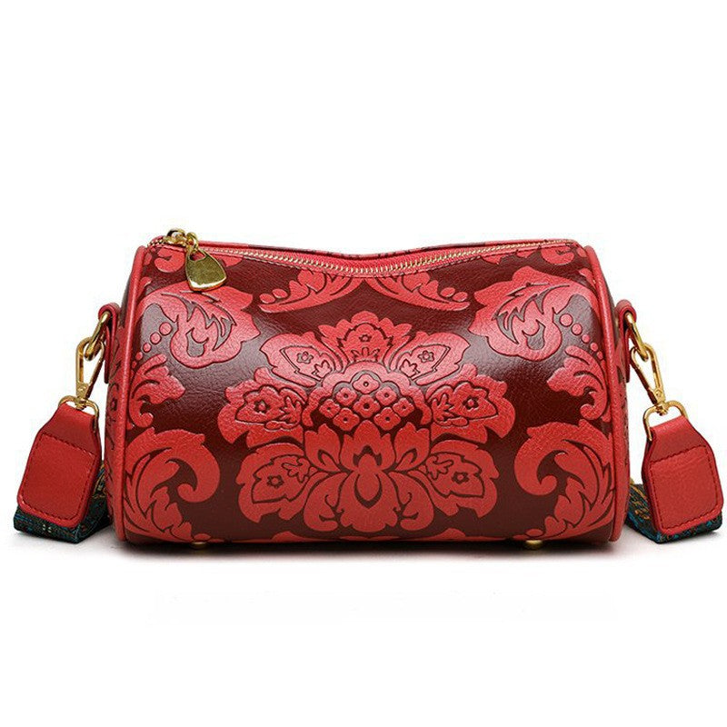 Bolsa Cilíndrica Clássica com Relevo Floral Retrô