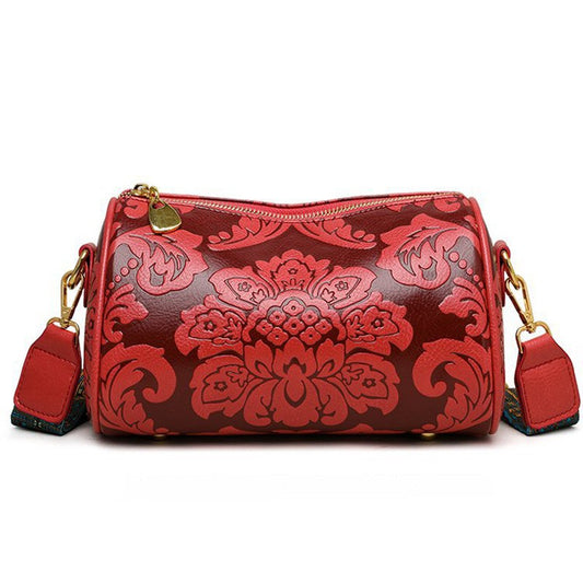 Bolsa Cilíndrica Clássica com Relevo Floral Retrô